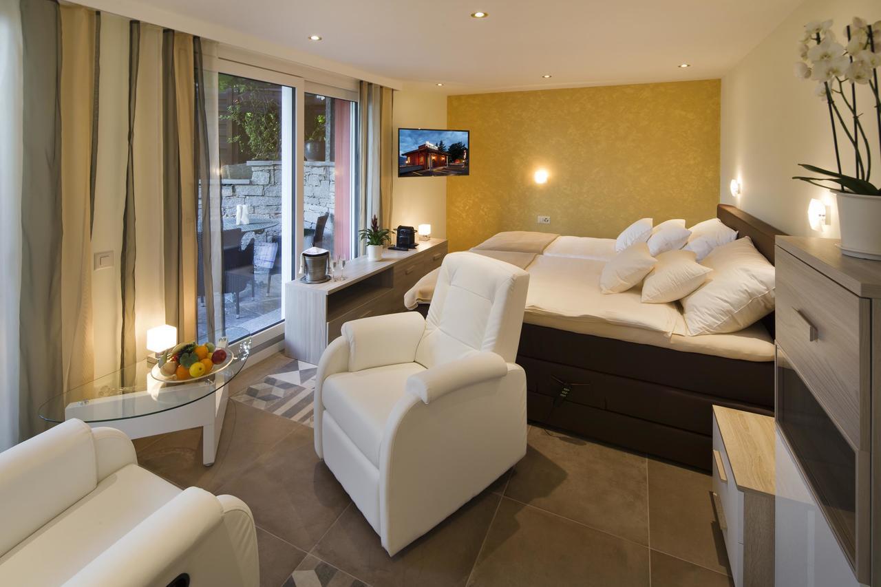 Boutique Hotel Albergo Brione Minusio Exterior foto