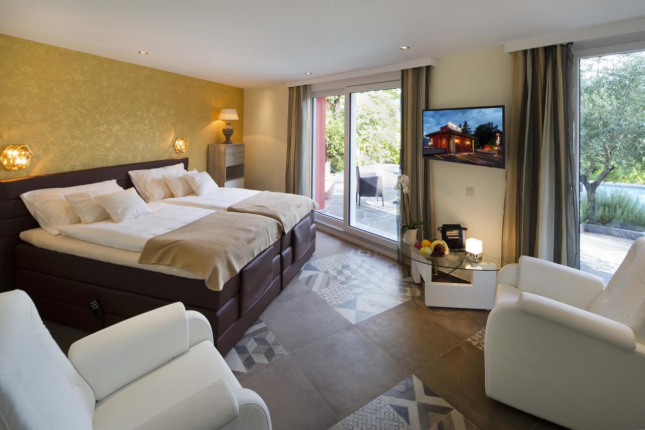 Boutique Hotel Albergo Brione Minusio Exterior foto